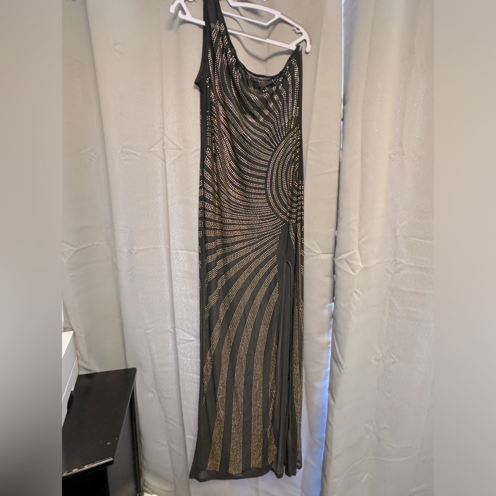 Sheer, black and gold New Year’s Eve dress